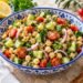 Chickpea, cucumber and tomato salad with lemon and fresh herbs