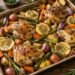 Lemon-herb chicken and vegetables roasted together on a sheet pan